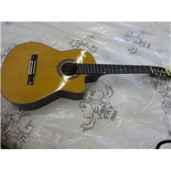 Angelic guitar with cuts for electric adaptation