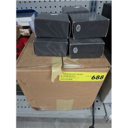 Case of battery operated clocks in Lucite