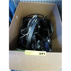 Box of game controllers and connector cables