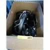 Image 1 : Box of game controllers and connector cables