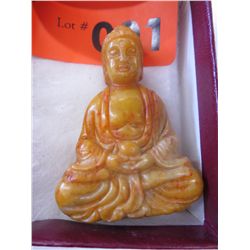 Hand carved yellow jade Buddha. Approx. 3"