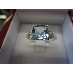 Princess cut .12 carat diamond & blue topaz ring