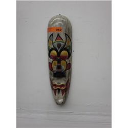 Carved decorative wall mask. 5" x 19"