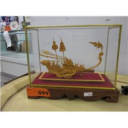 Wood ship model in glass box