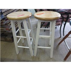 A pair of 28" tall stools. 13" dia seats.