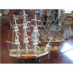 Two wooden model ships 11" x 12"