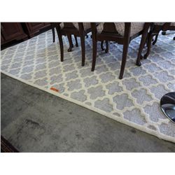 Sculpted ivory and grey area rug