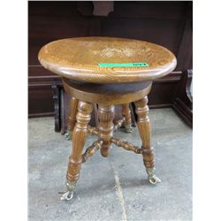 Adjustable oak piano stool