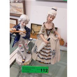 A pair of Japanese figurines