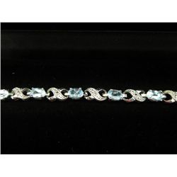 Blue Topaz & diamond tennis bracelet