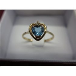 Blue topaz & diamond ring, 10KT yellow gold