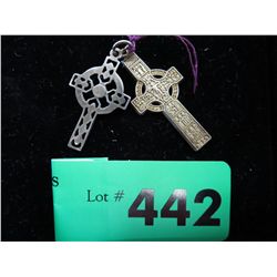 Two silver Celtic crosses