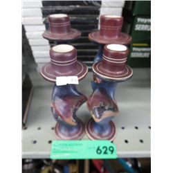 Four soapstone candle holders