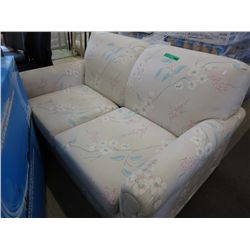 Two upholstered loveseat hide-a-beds - used