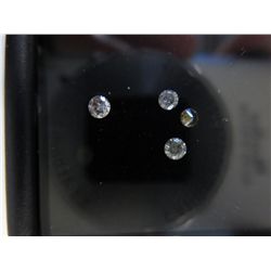 Four round cut genuine diamonds