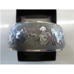 Ladies' metal cuff with Zodiac calendar animals