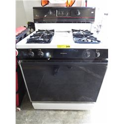 Four burner GE XL44 gas stove