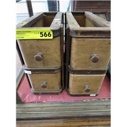 Two antique pull out drawer sets.