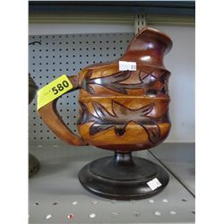 Carved wooden jug 9" tall, 7" dia.