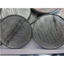 Coin tube filled with Great Canadian Moments coins