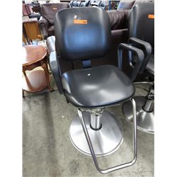 Hydraulic hair dressing chair