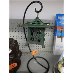 Hanging metal tea light holder