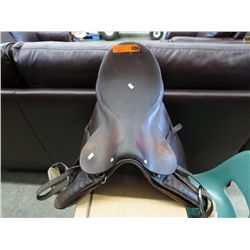 English riding saddle with stirrups and pad