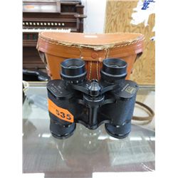 Binoculars with leather case