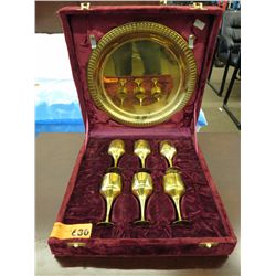 Brass tray with six goblets in a velvet box