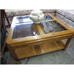 1980's wood coffee table with smoke glass inserts