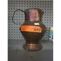 Copper pitcher with handle. 9" tall, 7" dia.
