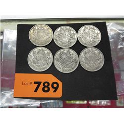 Six Canadian 50-cent pieces - circulated
