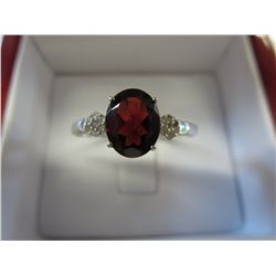 Red Garnet ring set with 14 Diamonds