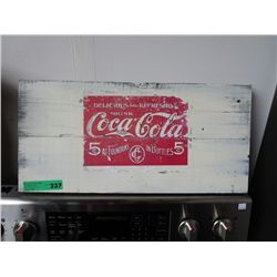 Folk art Coca-Cola sign. Paint on Board