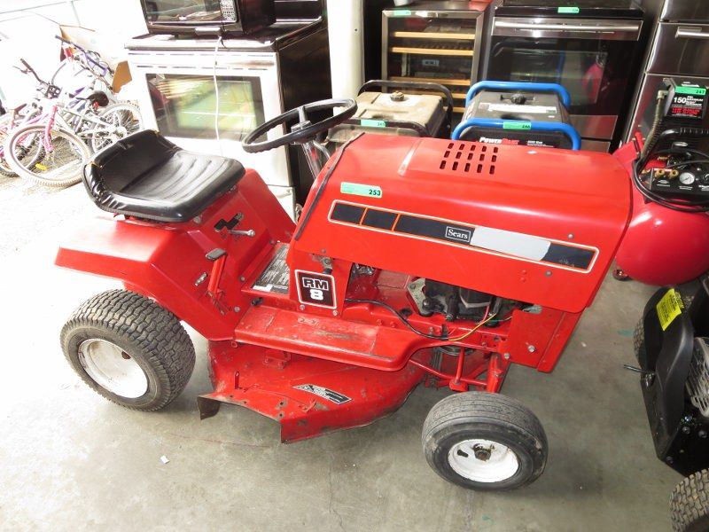 Craftsman riding lawnmower, red.