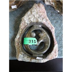 Carved stone statue 9.5" x 7"