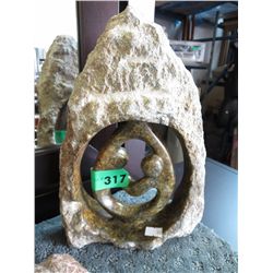 Carved stone statue 9.5" x 7"