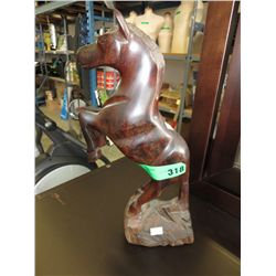 Carved wooden horse. 15" tall, 5" x 3" at base