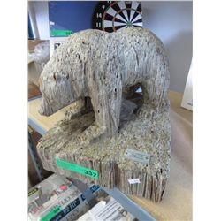 Wood carving of a bear