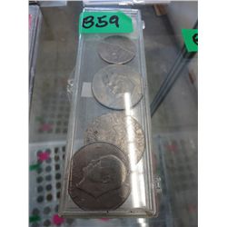 US coins 3 x $1 coin and 1 half dollar coin