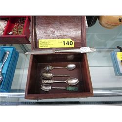 Wood box with five pieces of sterling