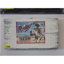 Folk art painted sign "Rodeo Lager Beer"