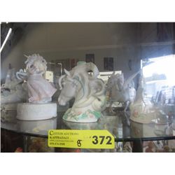 8 Unicorn statuettes and music boxes