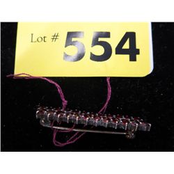 Vintage bar brooch with 24 round red stones