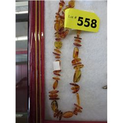 Knotted amber necklace, 16"