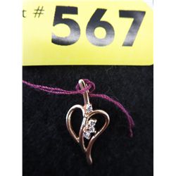10K heart pendant with 3 diamonds