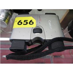 Canon binoculars - slide out.