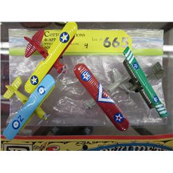 Four miniature metal planes