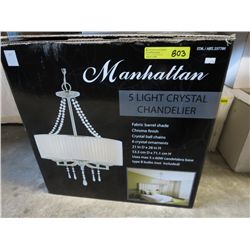 Five light chandelier with a fabric barrel shade