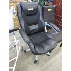 Black leather swivel hydraulic office chair